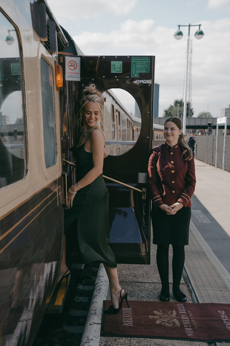 Elegant guest boarding a Northern Belle charter